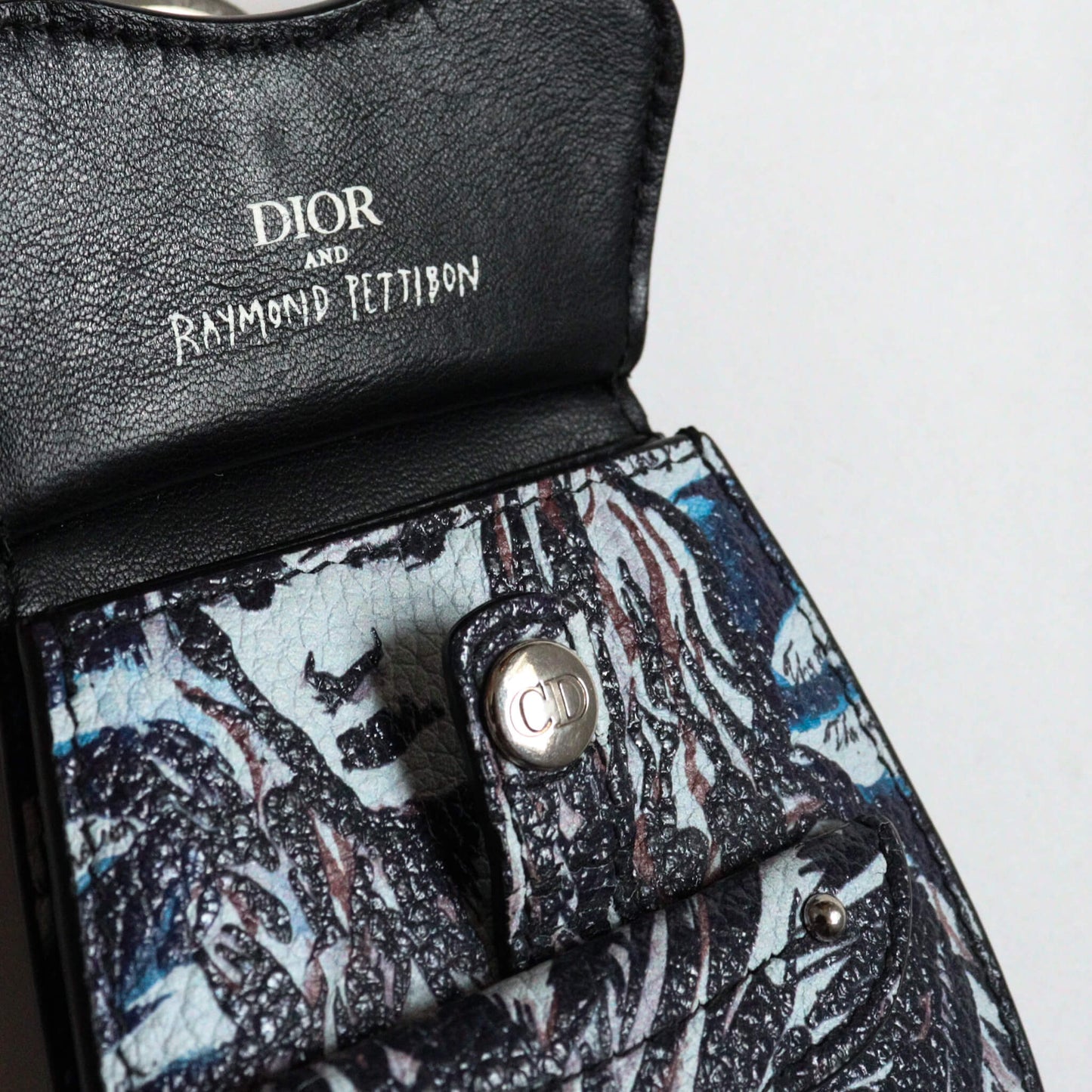 Llavero Dior x Raymond Pettibon